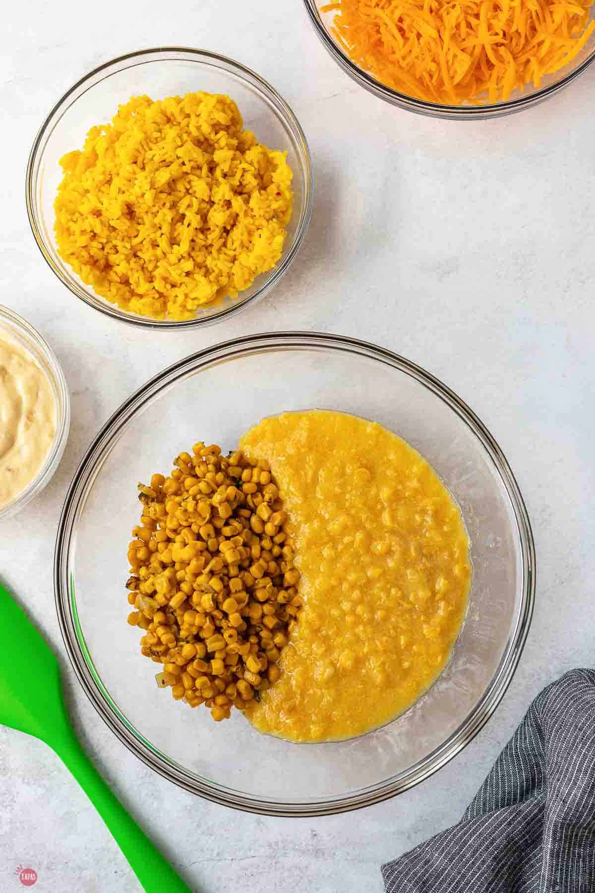 Fire roasted corn and creamed corn in a glass mixing bowl