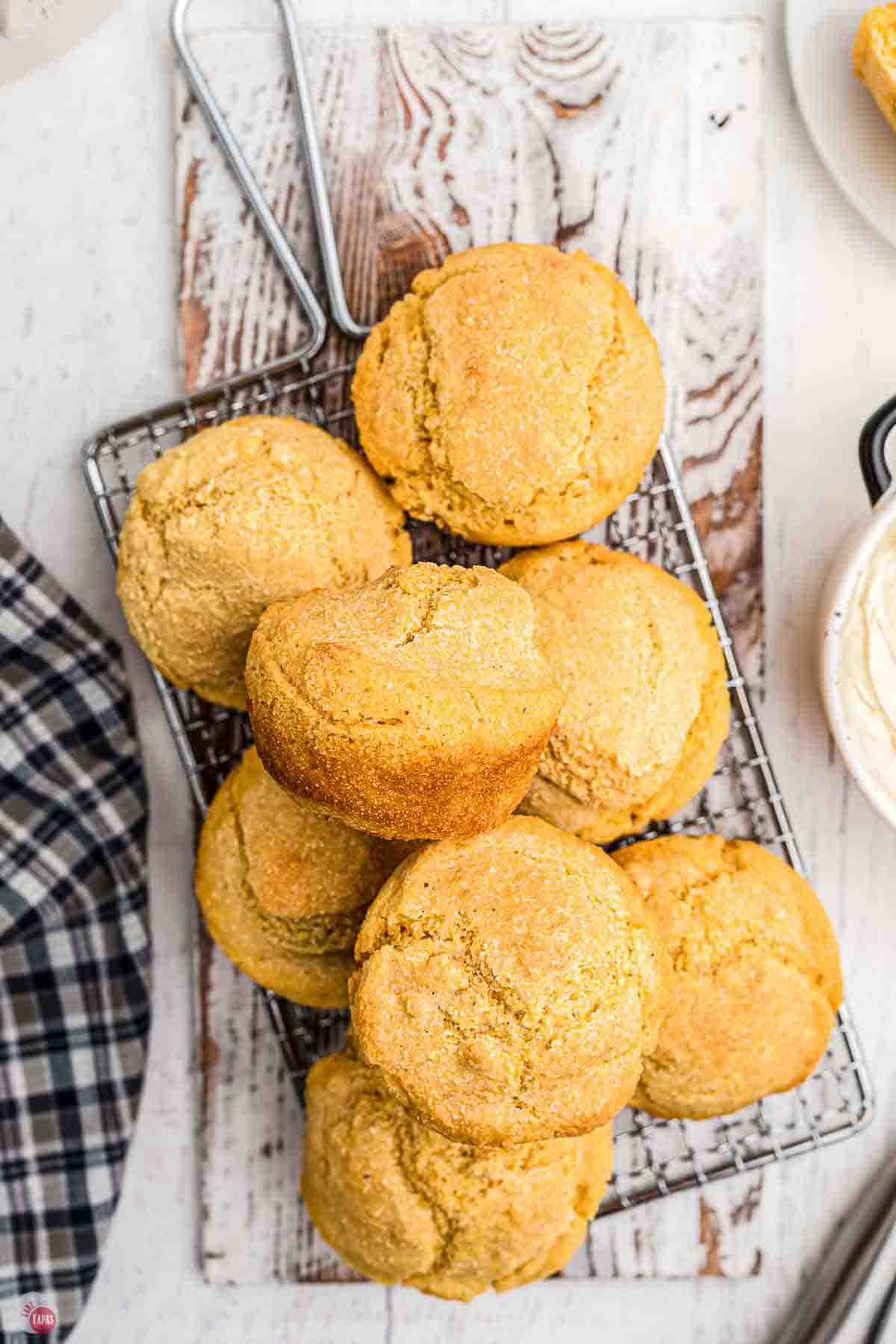 metal cooling rack topped with cornbread muffins