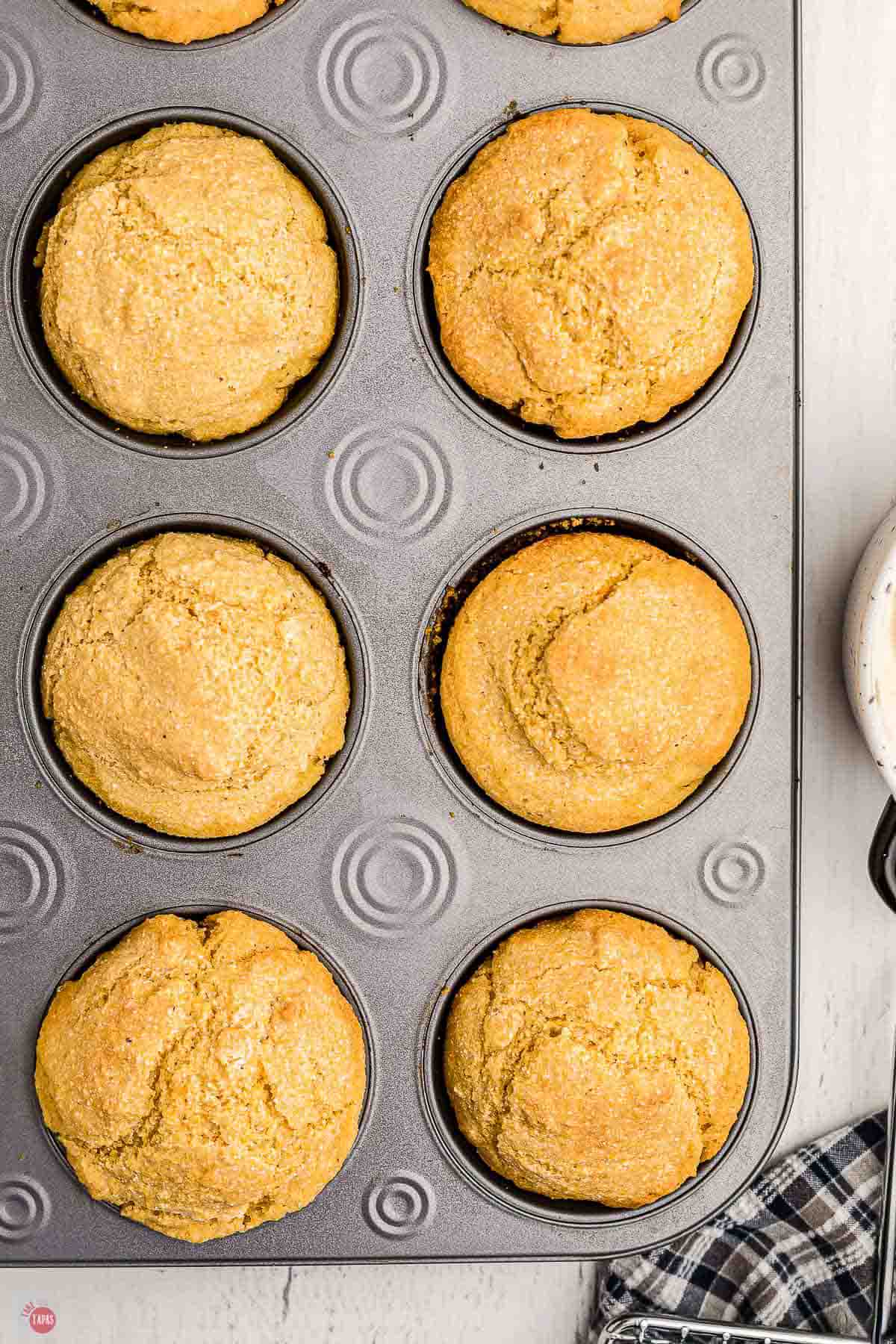 close up of white lily cornbread muffins in a muffin pan
