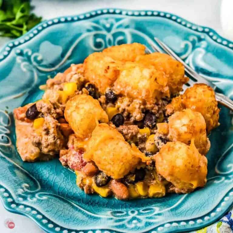 blue plate with cowboy casserole and tater tots