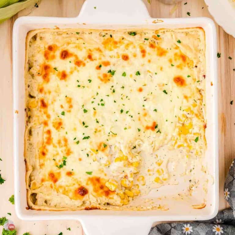 white square casserole dish with corn side dish