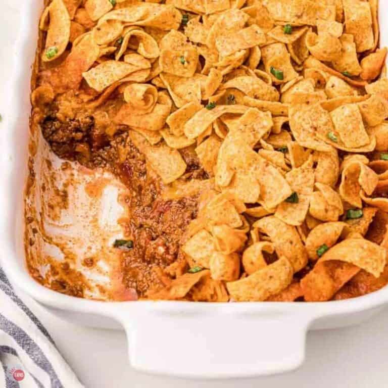 Frito casserole with a scoop missing