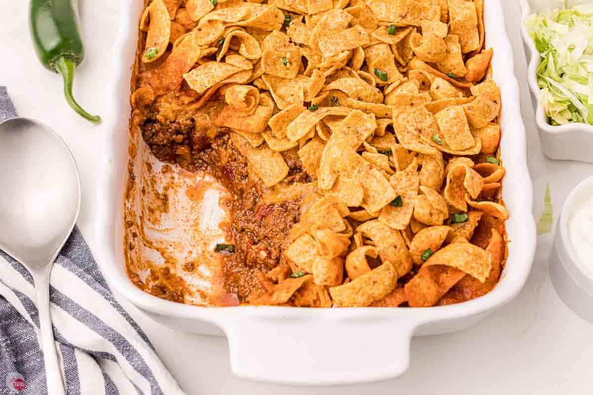 frito pie casserole in a white baking dish