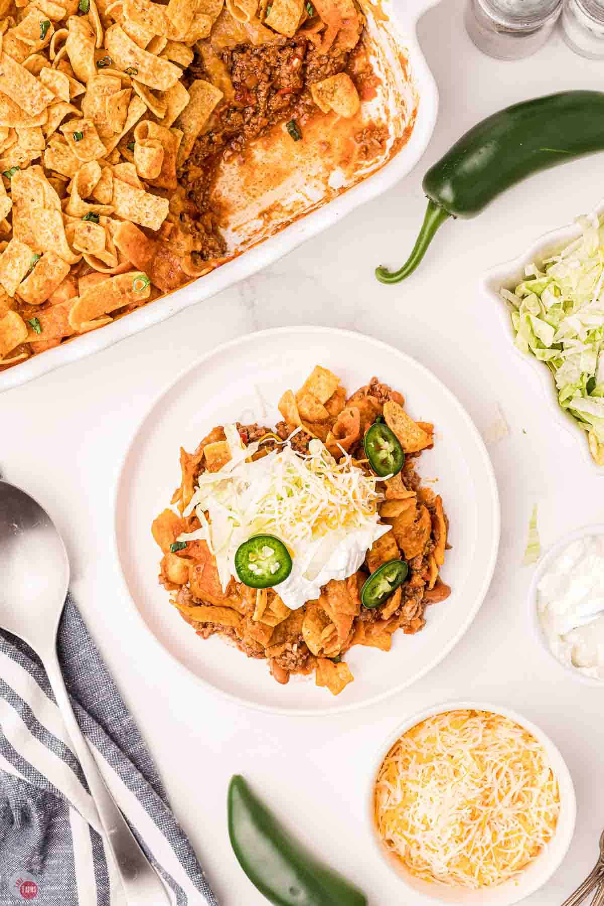 plate of Frito casserole next to a dish