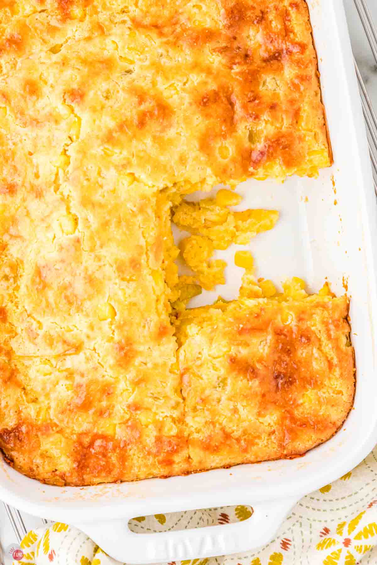 casserole in a white dish with a serving removed