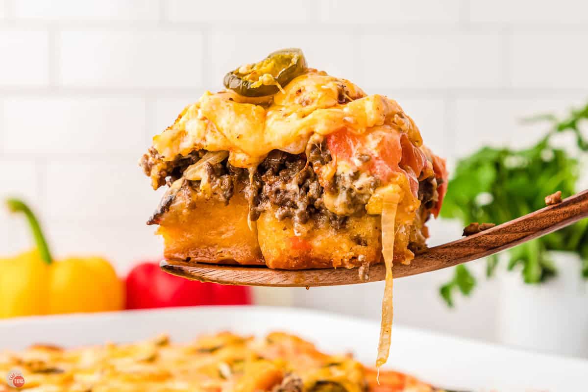 slice oh John Wayne casserole on a wood spoon