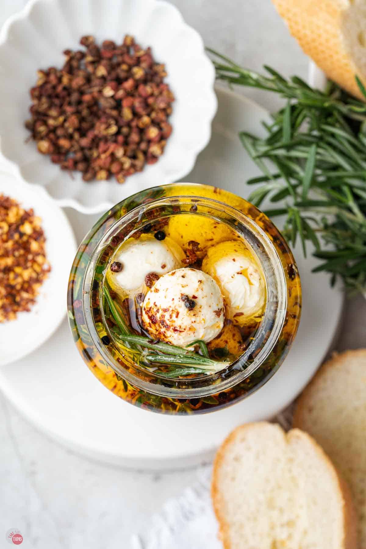 overhead picture of jar of marinated cheese balls