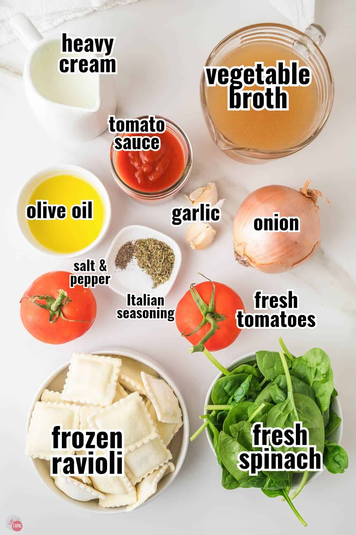 Labeled ingredients for ravioli soup including frozen ravioli, fresh spinach, fresh tomatoes, vegetable broth, heavy cream and tomato sauce