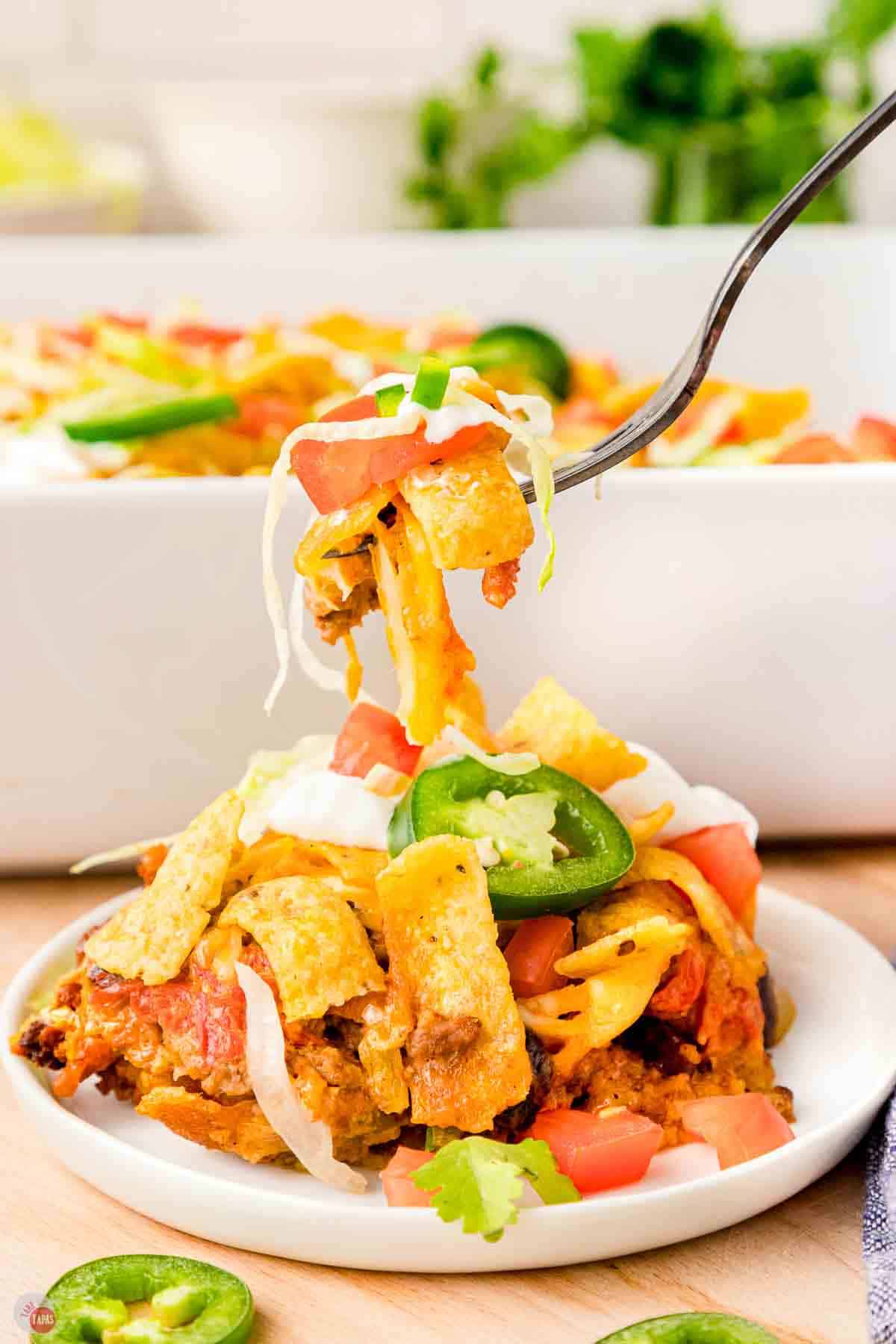 fork with bite of walking taco casserole